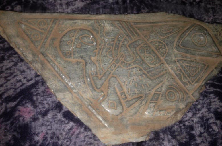 Bareljevi mehiške jame s podobami tujcev